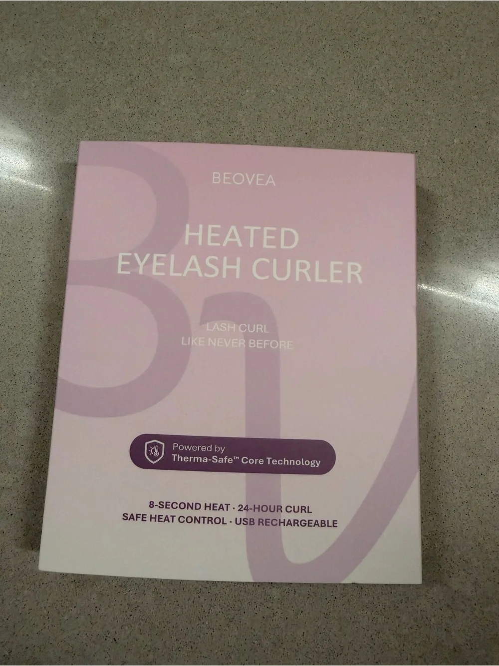 Heated eyelash curler